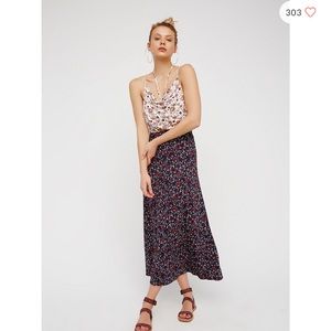 Cowl neckline, maxi dress with open back, sexy!